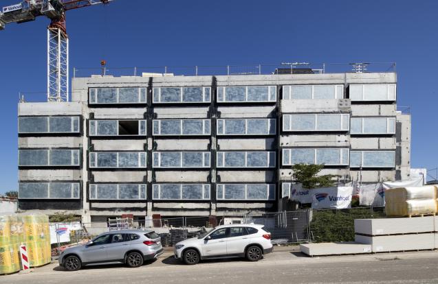Renovatie van de kantoorgebouwen van Buildwise en bouwen van een loods